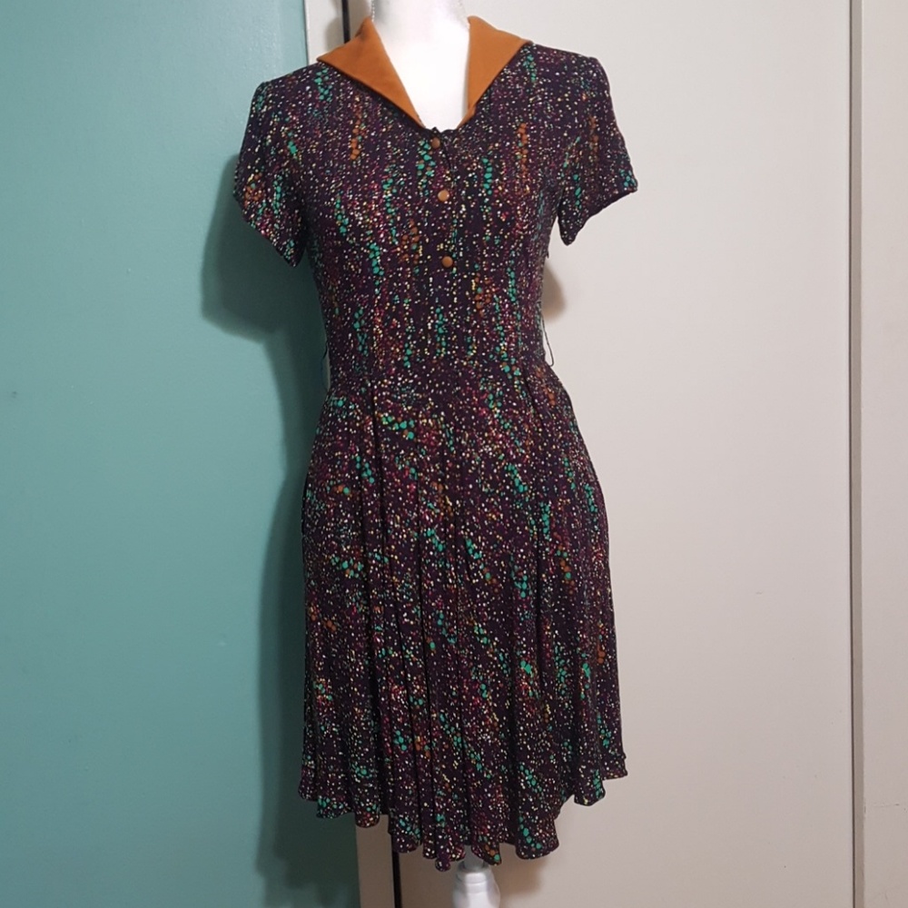 Super cute fitted vintage dress.. I believe 60s
